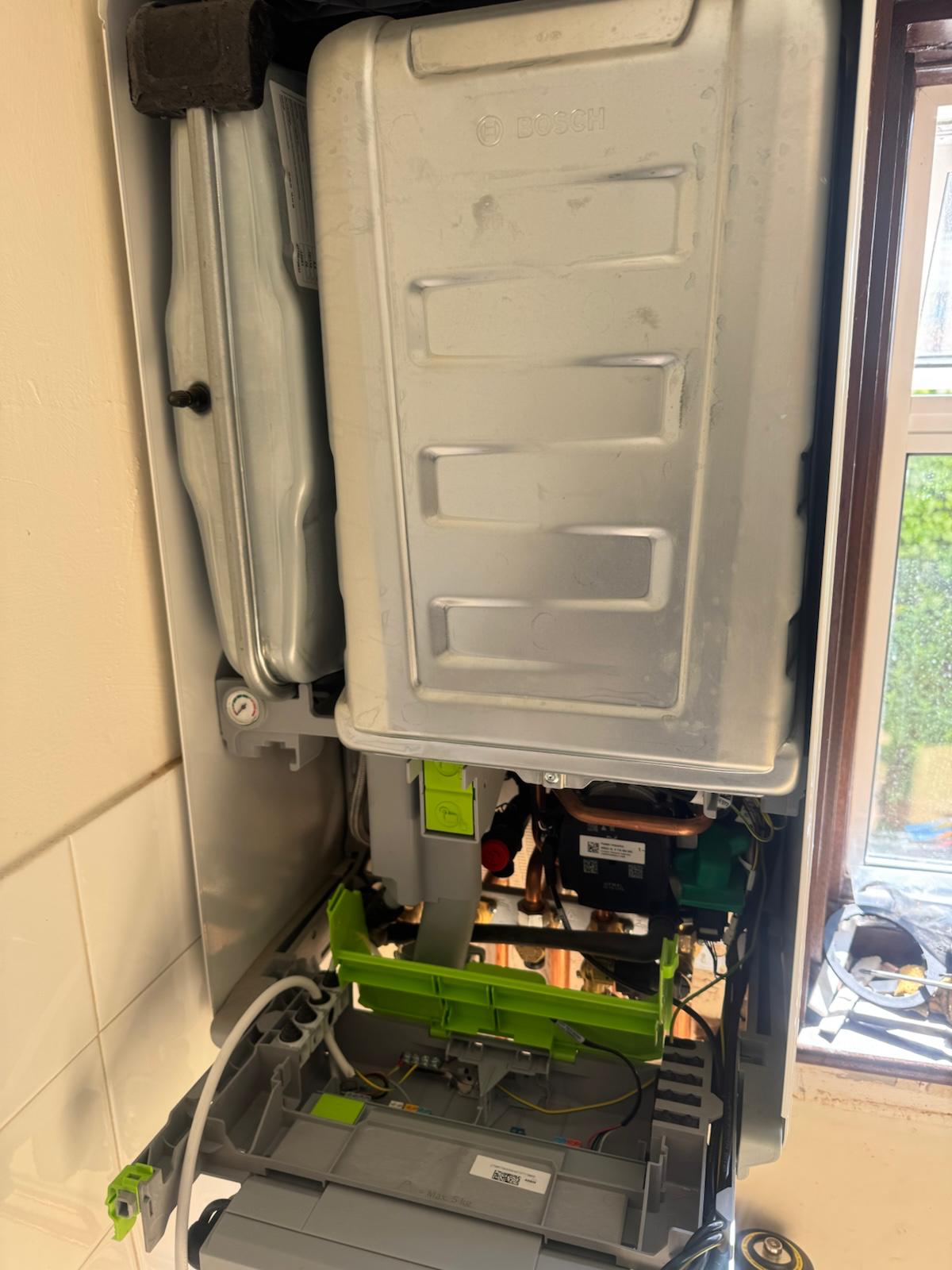 Gas Safe engineer completing gas safety certificate in Chatham Kent